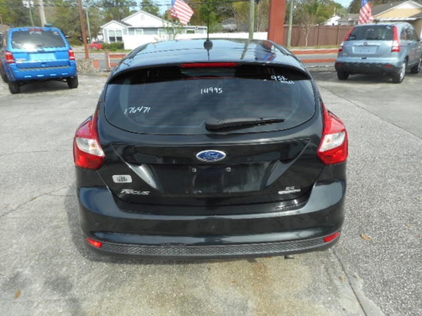 2014 BLACK FORD FOCUS SE (1FADP3K25EL) , located at 10405 Abercorn Street, Savannah, GA, 31419, (912) 921-8965, 31.988262, -81.131760 - Photo#5